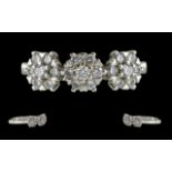 Ladies Pleasing Quality 18ct White Gold Diamond Set Triple Cluster Dress Ring, marked 750 to