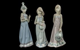 Lladro - Hand Painted Trio of Porcelain Figures ( 3 ) Model Numbers 5647 - 5643 - 5604. All