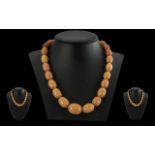 A Vintage - Excellent Quality Butterscotch Amber Graduated Beaded Necklace with 9ct Gold Clasp.