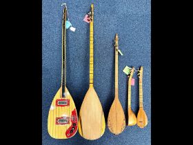 Collection of Five Saz, various sizes, Turkish, largest approx. 44'' long.