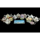 Twelve Miniature Tea Pots, including Staffordshire, Crown Windsor, Past Times, etc.