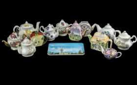Twelve Miniature Tea Pots, including Staffordshire, Crown Windsor, Past Times, etc.