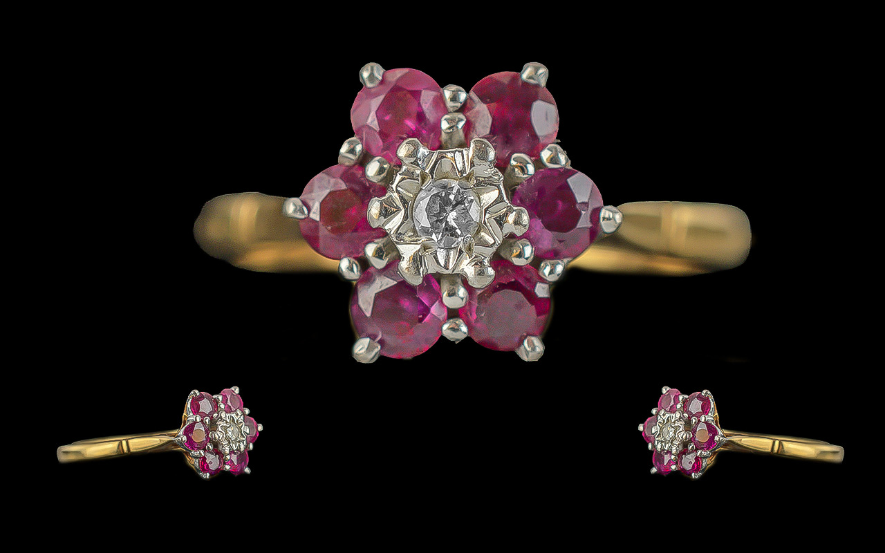 Ladies Pleasing 18ct Gold Ruby and Diamond Set Cluster Ring, flower head design; full hallmark to