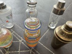 Three Vintage Cocktail Shakers, together with three vintage glass stoppered water/wine jugs.