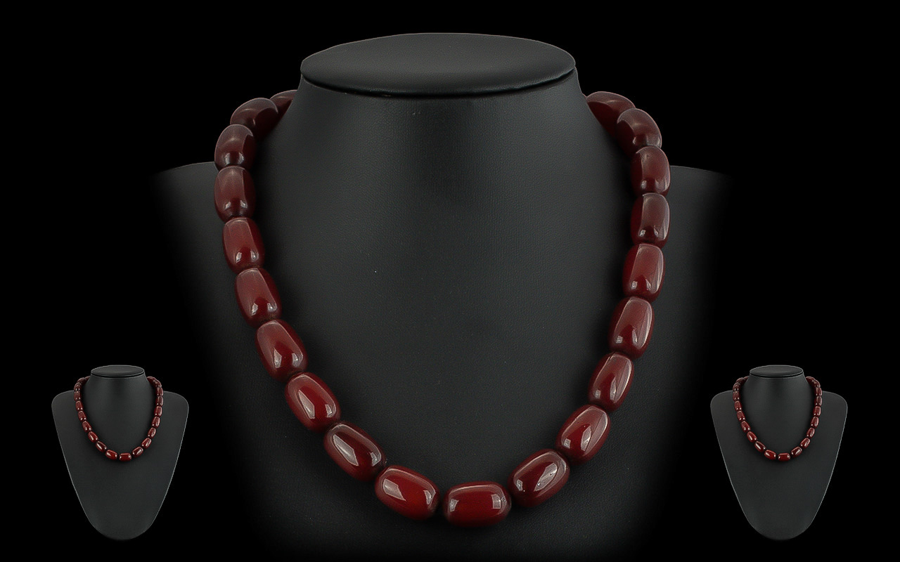 Early 20th Century Cherry Amber Beaded Necklace - Of Excellent Colour. Weight 49.7 grams. Length