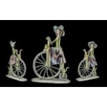 A vintage - e tazza signed porcelain hand painted figure ' girl on a penny farthing ' signed e