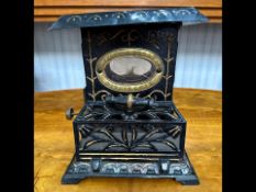 Small Novelty Cast Iron Stove, made by Wright & Butler, Birmingham. Height 11'', width 9.5''.