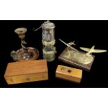 Box of Collectibles, including a brass desk aeroplane, small brass oil lamp No. 46, wooden twist