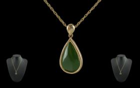 14ct Gold - Tear Drop Jade Set Pendant with attached later 9ct Gold Chain. the pendant marked