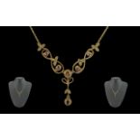 Antique period 9ct gold integral open-worked garnet set necklace with drop. marked 9ct. well matched