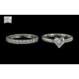 A Certificated Single Stone Diamond Ring Heart shaped diamond set in platinum with GIA