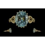 Ladies Attractive 9ct Gold Single Stone Aquamarine Set Ring. Double heart shaped shank setting.