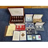 A Collection of Coins to Contain a boxed set of silver spoons, commemorative coins, proof sets,