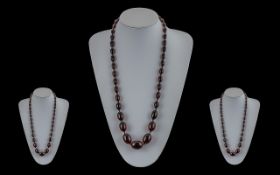 Cherry Amber Style Double Knotted Necklace. cherry amber necklace of graduating form, double