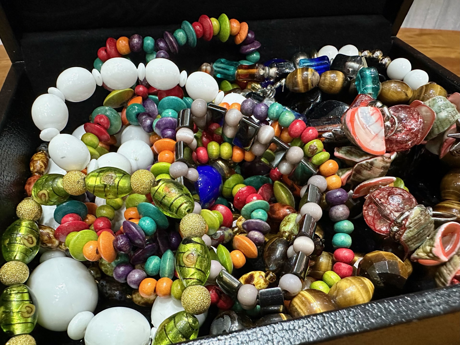 Box of Costume Jewellery, comprising assorted coloured beads, bracelets, etc., housed in a black - Image 3 of 4