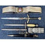 Two Copy German Daggers, Luftwaffe First & Second Pattern, together with two copy belt and