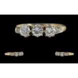 Ladies 18ct Gold 3 Stone Diamond Set Ring - No hallmark but Tests 18ct. The 3 Well Matched Round
