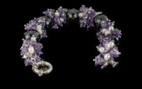 Obsidian Amethyst and Pearl Bracelet, comprising large, faceted, round, black obsidian beads with