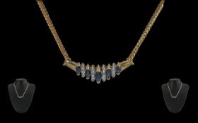 Ladies 14ct Gold Pleasing Design Sapphire & Diamond Set Necklace, marked 14ct. The boat shaped