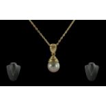 Ladies - 18ct Gold Pearl Drop Attached to a 18ct Gold Chain. both marked 750 - 18ct, the single