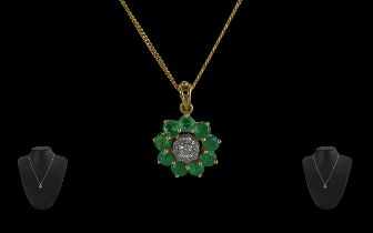 Ladies Pleasing 14ct Gold Emerald and Diamond Cluster Pendant - With An attached 9ct Gold Chain.