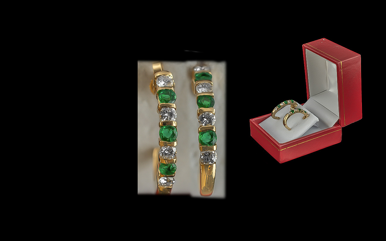 Ladies - 14ct gold excellent pair of emerald and diamonds set half hoop earrings. marked 14ct. the