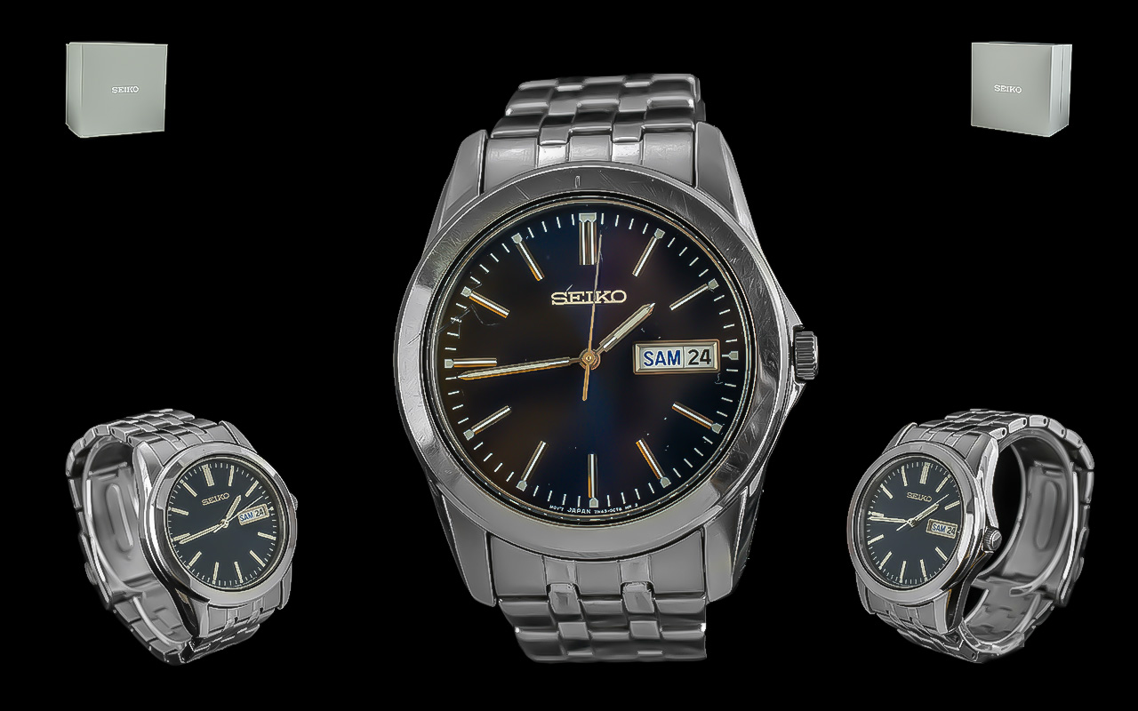 Gent's Seiko Watch, chrome bracelet strap, black face, baton numerals, date aperture, in original