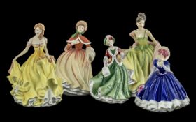 A Collection of Porcelain Figures comprising Royal Doulton Pretty Ladies Mary, Summer, Autumn, Royal