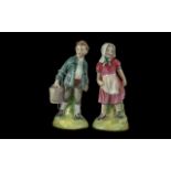 Royal Doulton Pair of Hand Painted FIgures 'Jack and Jill', model nos. HN2060 and HN2061, issued