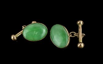 Chinese 18ct gold pair of jade set Cufflinks, Chinese character marks, tests 18ct gold, the oval