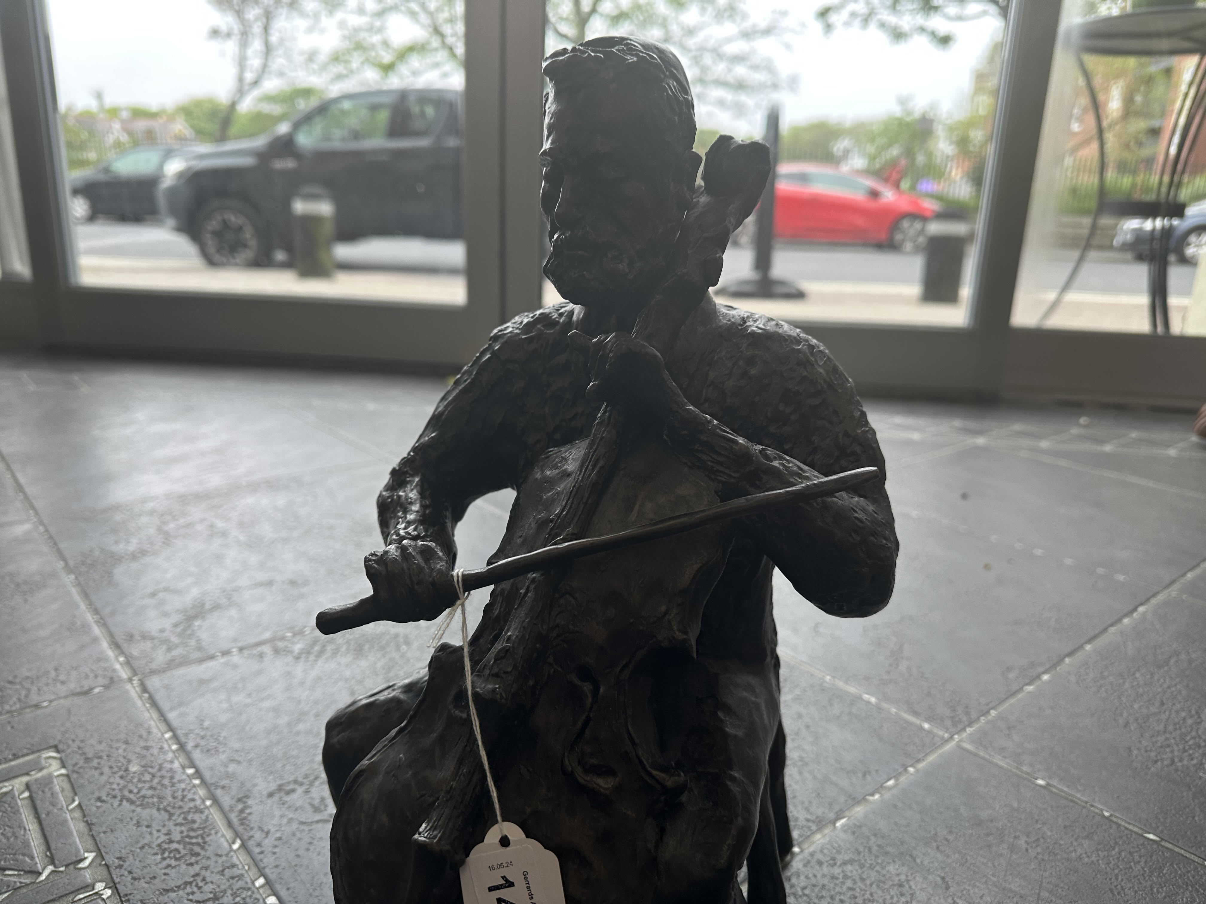 Spelter Statue of a Man Playing a Cello, seated, well carved, measures 16'' high. - Image 2 of 3