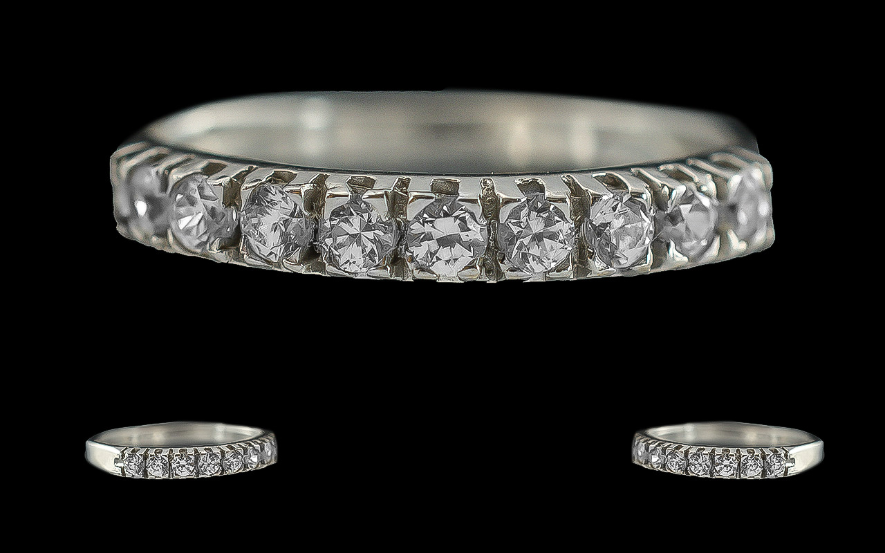 18ct white gold ladies - 9 stone diamond set ring, marked 750 - 18ct to interior of shank, the