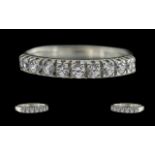 18ct white gold ladies - 9 stone diamond set ring, marked 750 - 18ct to interior of shank, the