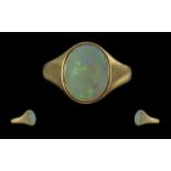 Ladies Excellent 18ct Gold SIngle Stone Opal Set Ring, Full hallmark to shank, the oval shaped