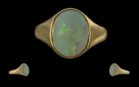 Ladies Excellent 18ct Gold SIngle Stone Opal Set Ring, Full hallmark to shank, the oval shaped