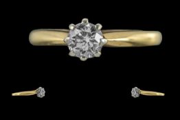 Ladies pleasing 18ct gold single stone diamond set ring. marked 18ct to interior of shank. the round