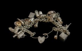 Fine Quality Sterling Silver Charm Bracelet Loaded with Approx 20 Silver Charms, All Marked for