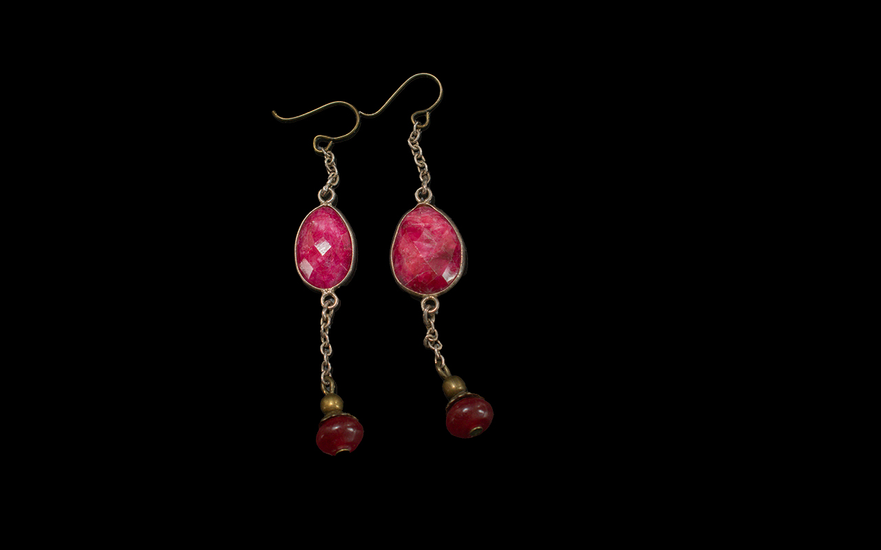 Pair of Drop Earrings, set with an oval