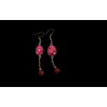 Pair of Drop Earrings, set with an oval