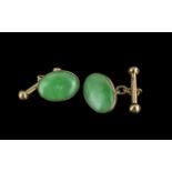 Chinese 18ct gold pair of jade set Cuffl