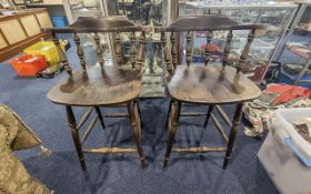 Two Tall Dark Wood Bar Seats, spindle backs, measure 40