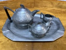 Art Deco Pewter Tea Set, with tray, tea pot, sugar bowl and milk jug. Marked Holland Lrnia to base.