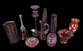 Collection of Cranberry Glass Items, comprising a tall 9.5'' candle holder, a pin dish, three bud