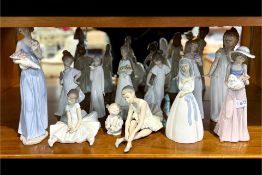 Collection of Nine Pieces of Nao and three other Spanish figures. Mostly women, with flowers,