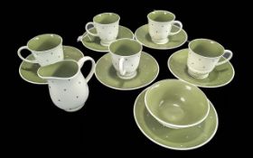 Susie Cooper Coffee Set, comprising five cups, six saucers, milk jug and sugar bowl in a delicate