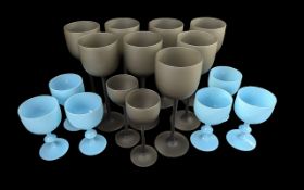 Collection of Coloured Wine Glasses, comprising eight tall smoky grey tall wine glasses, 9'' tall,