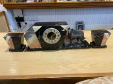 Art Deco Clock Garniture Set, comprising a central black marble clock with a figure of a German