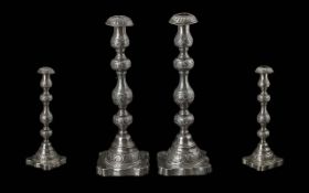 A Fine Pair of Sterling Silver Judaica Candlesticks of Pleasing Form with Cadroon Bases. Hallmark