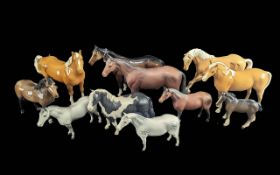 Collection of Thirteen Beswick Horses, includes Palominos, greys, brown gloss, brown matt, etc.
