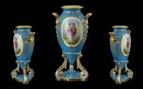 Minton Style Painted Twin Handle Vase, Raised on a Trio of Legs Base. The Central Panel Depicts a